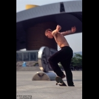 Young man skating in the Square of Civic Center