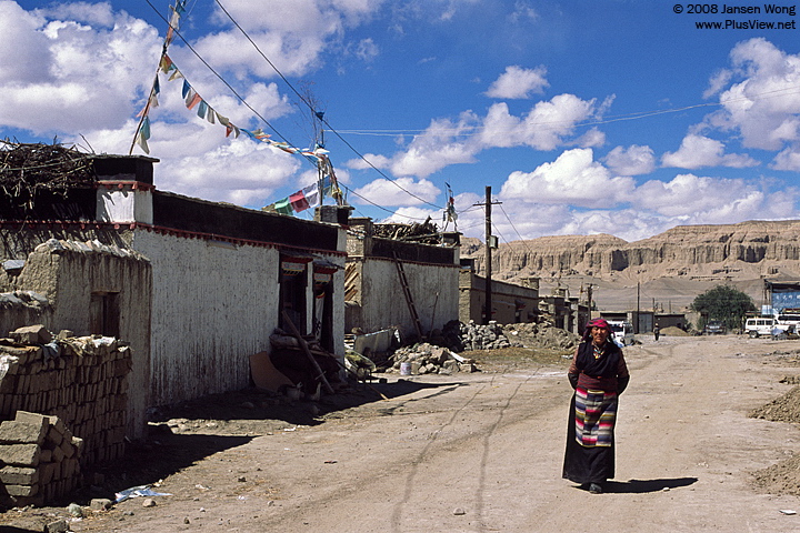 A woman pass through Zanda old town