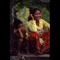 Mom & son sitting outside of Bakong, Siem Reap