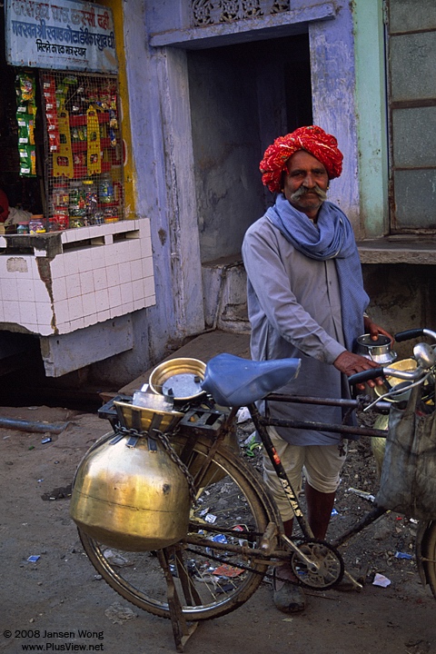 Man delivering milk, Bundi, India