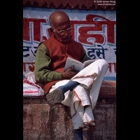 A man reading book on the ghat of Ganges, Varanasi