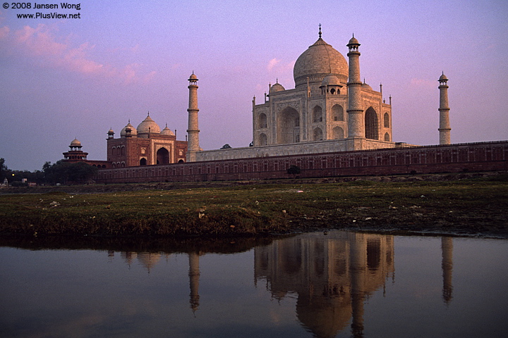 Taj Mahal reflecting in Yamuna River at dusk