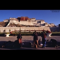 Pilgrims prostrating in front of the Potala Palace
