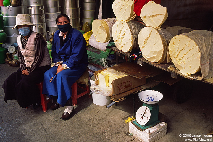 Yak Butter vendor in Tromsikhang Market, Lhasa