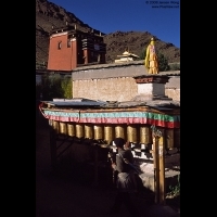 Pilgrim spinning prayer wheels along the Tashilhunpo Kora