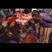 Meat vendor in local market, Siem Reap