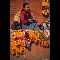 Woman selling praying flowers, near Durba Square, Kathmandu