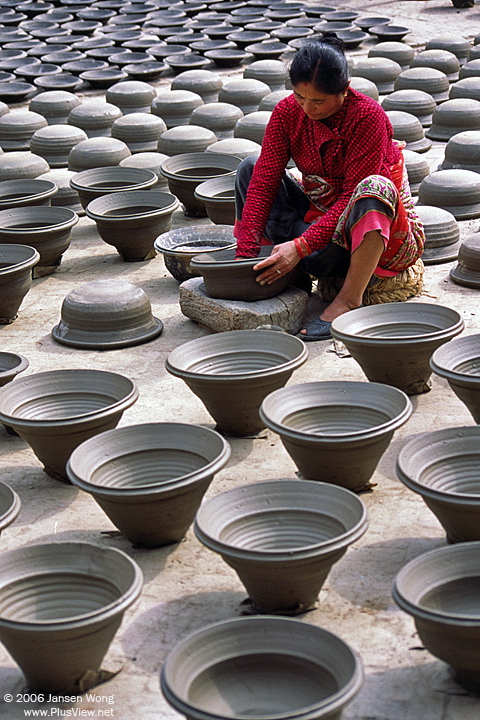 Woman making pottery, Bhaktapur, Nepal