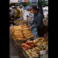 Bread vendor in local market, Siem Reap