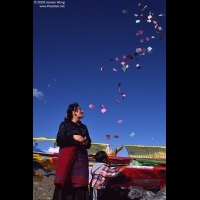 Mom & son throwing paper Wind Horse to sky, Bumpa Ri, Lhasa