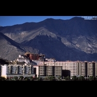 Potala Palace & modern Chinese-style building from Sichuan-Tibet Highway
