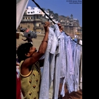A man drying clothes on the bank of Ganges