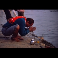 Pilgrim praying on the bank of Ganges, Varanasi